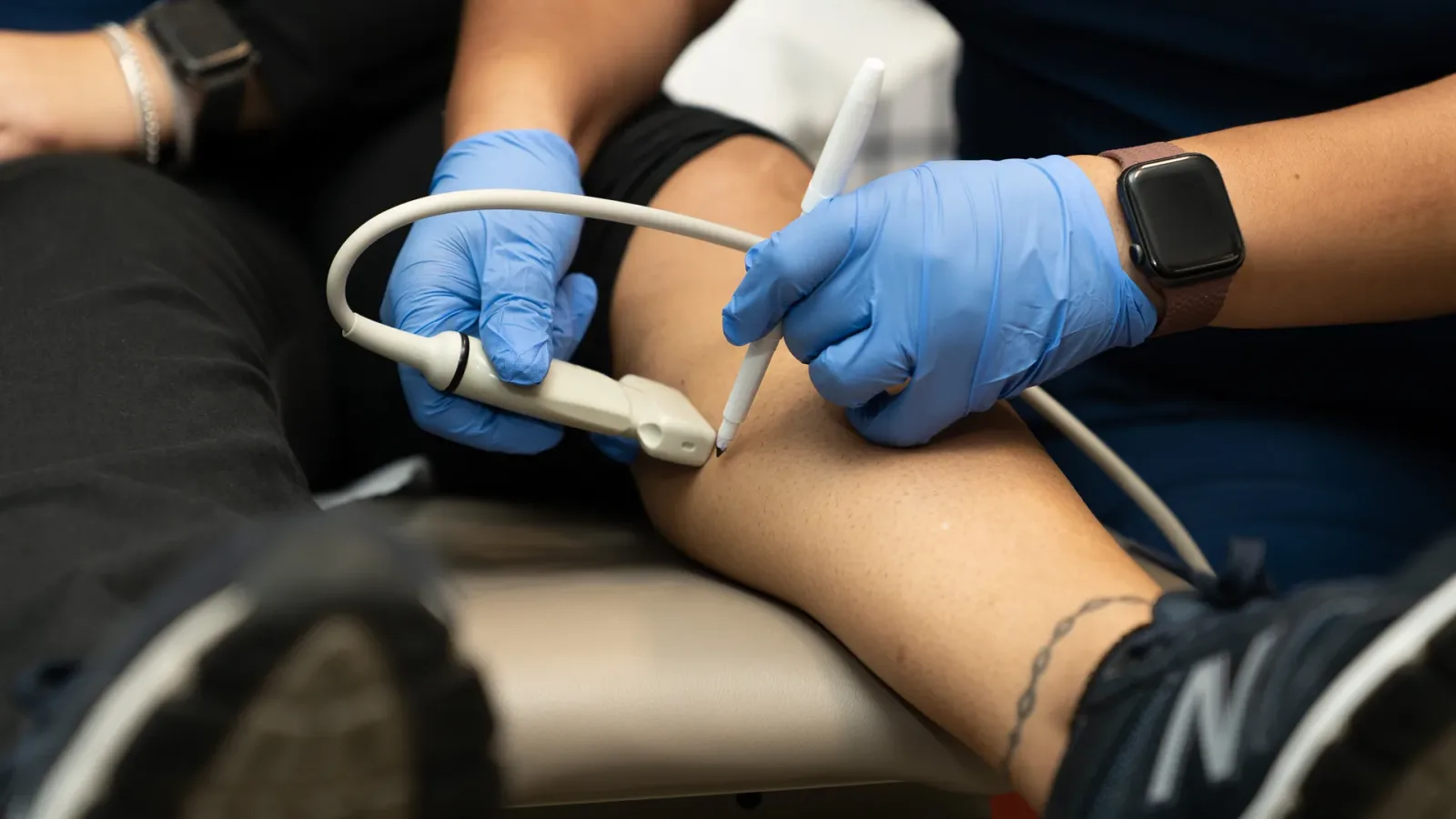 Specialist performing a radiofrequency ablation procedure at Vein Center Doctor